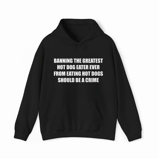 The "Banning The Greatest Hot Dog Eater Ever From Eating Hot Dogs Should Be A Crime Hoodie" features bold white text on black and makes a funny gift for anyone who loves Illegal Shirts and hot dog humor.
