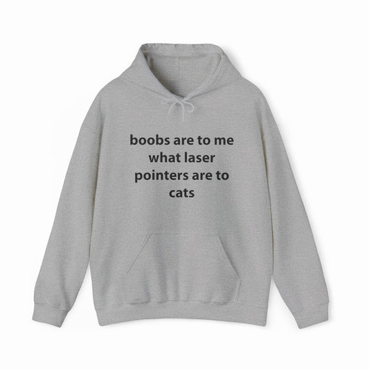 The Boobs Are To Me What Laser Pointers Are To Cats Hoodie from Illegal Shirts features a bold, cheeky design in light gray—perfect for anyone who loves clever, funny humor.