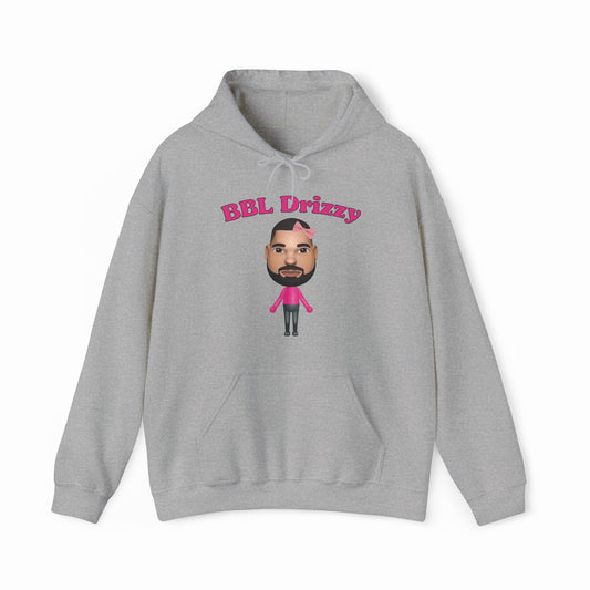 The BBL Drizzy Hoodie is a gray cotton-poly hoodie featuring “BBL Drizzy” in pink and a cartoon bearded character with a heart-shaped bandage, part of the distinctive Illegal Shirts collection.