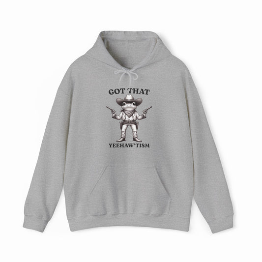 The Got That Yeehaw'Tism Hoodie is a gray, medium-heavy hoodie featuring a cartoon cowboy with two pistols and bold “Got That Yeehaw'Tism” text—an ideal Illegal Shirts pick.