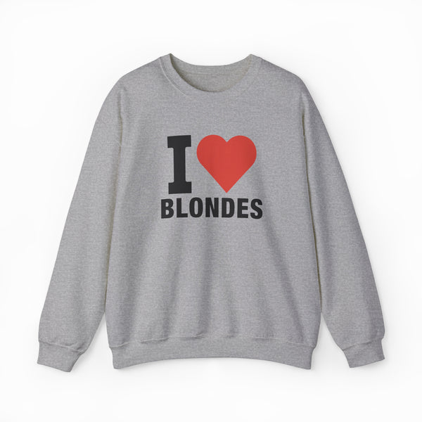 The I Heart Blondes Crewneck is a gray cotton-polyester sweatshirt with bold black lettering and a red heart on the front. Part of the Illegal Shirts collection, it's an eye-catching piece for anyone who loves standout style.