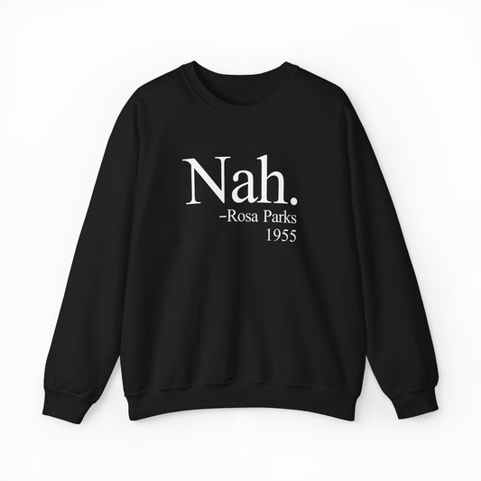 The Nah Crewneck is a black sweatshirt with white text—“Nah. -Rosa Parks 1955”—centered on the front, crafted from medium-heavy fabric for standout comfort and statement style among Illegal Shirts.