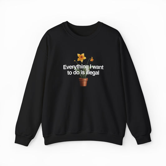 A black cotton-polyester crewneck featuring a potted yellow flower with sunglasses and raised hands above bold white "Everything I Want To Do Is Illegal" text—perfect for fans of Illegal Shirts.