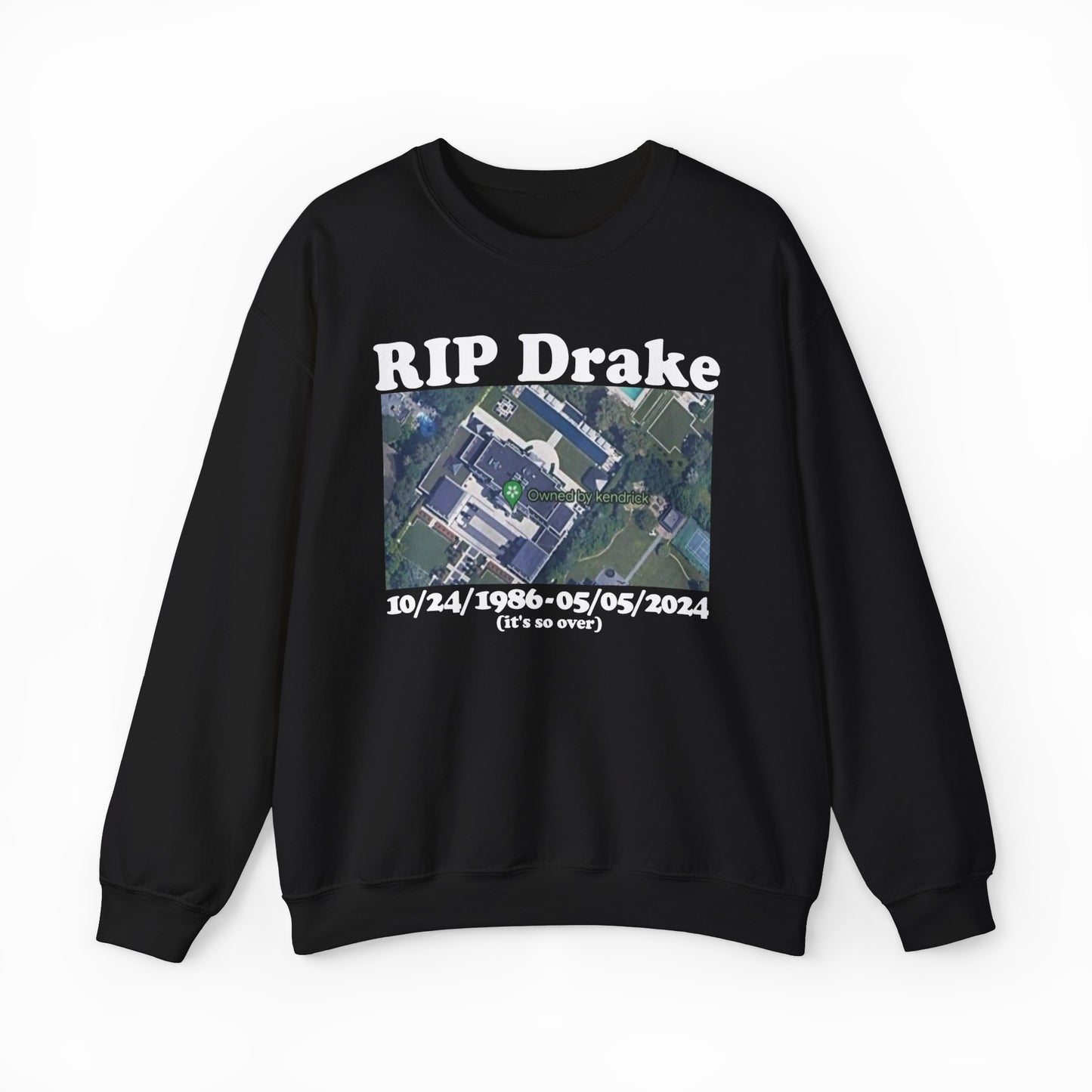 The RIP Drake (Owned By Kendrick) Crewneck is a black sweatshirt with “RIP Drake” above an aerial building photo, dates 10/24/1986–05/05/2024, and “(its so over)” in white—perfect for fans of bold, funny apparel.