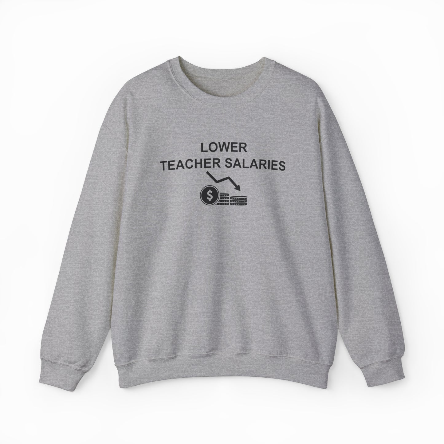 The Lower Teacher Salaries Crewneck is a gray sweatshirt with a premium print: "LOWER TEACHER SALARIES" above a downward graph, dollar sign coin, and coin stack. Part of our bold Illegal Shirts collection.