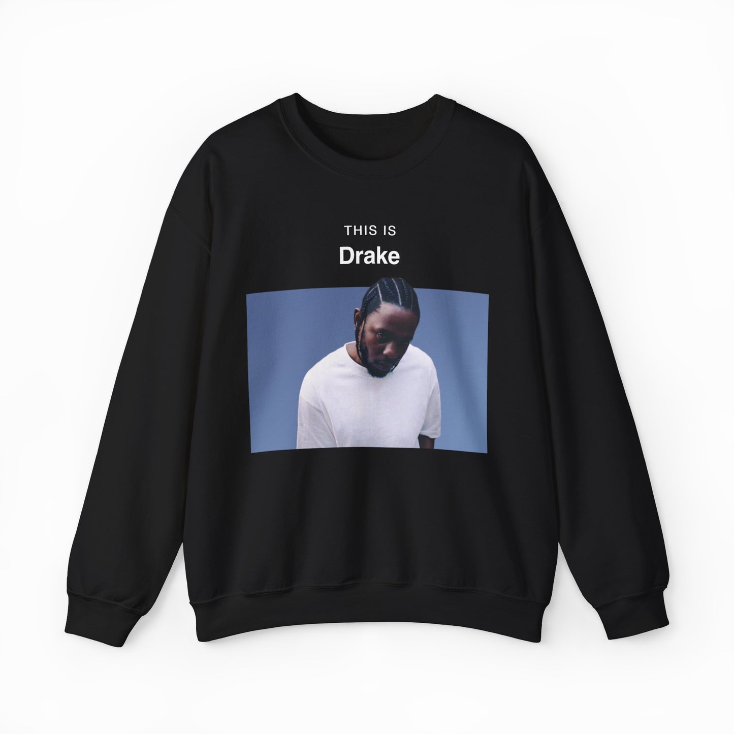 The This Is Drake Crewneck is a black sweatshirt with a photo of a man in a white shirt looking down and “THIS IS Drake” text above—ideal for fans seeking unique, funny shirts.