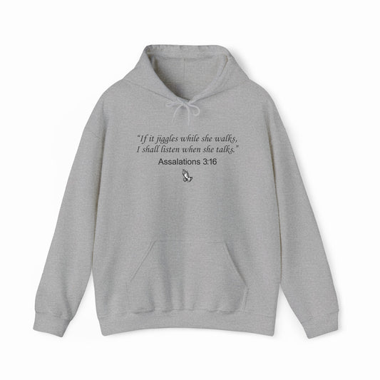 The Assalations 3:16 Hoodie features a light gray, medium-heavy fabric with “If it jiggles while she walks, I shall listen when she talks. Assalations 3:16” in black and a small pointing hand—an iconic Illegal Shirts design.