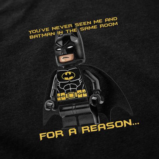 Featuring bold yellow text on black, the "You've Never Seen Me And Batman In The Same Room For A Reason... T-Shirt" is a funny conversation starter—ideal for fans of Batman and unique, witty shirts.