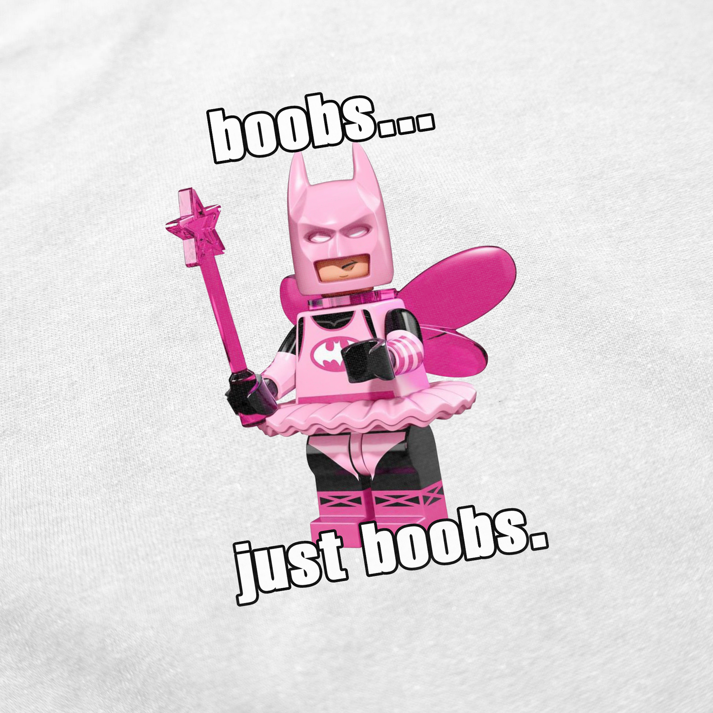 The "Boobs... Just Boobs. T-Shirt" features a whimsical LEGO-style pink fairy Batman holding a wand, with bold text above and below—perfect for anyone wanting a funny, eye-catching statement shirt.