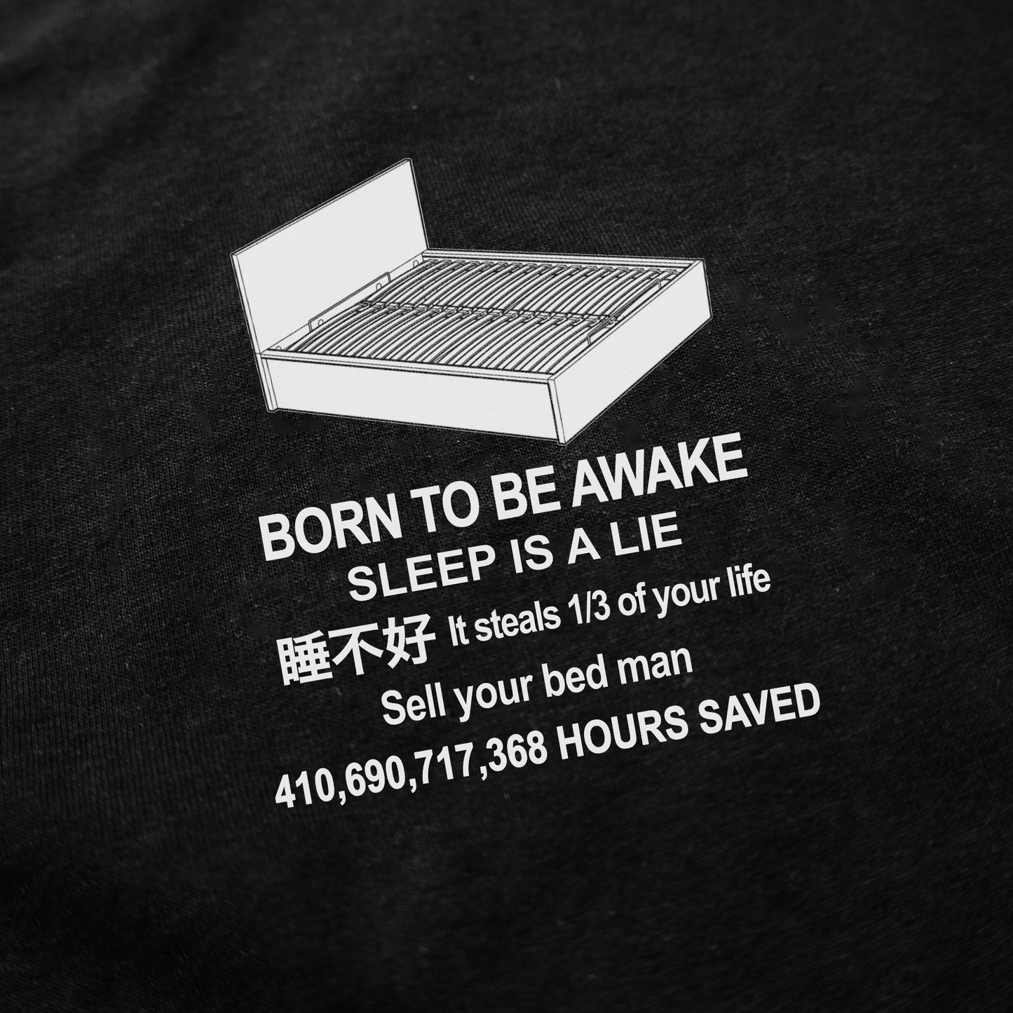 A bed graphic tops bold text—BORN TO BE AWAKE SLEEP IS A LIE—with phrases about sleep stealing time, selling your bed, and 410,690,717,368 HOURS SAVED. Perfect for fans of funny shirts and the Born To Be Awake T-Shirt on black.