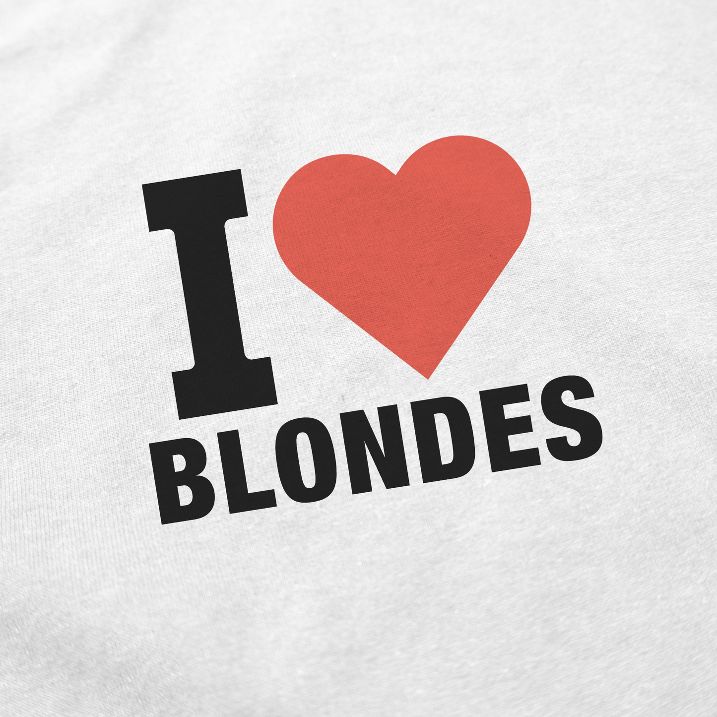 Close-up of the I Heart Blondes T-Shirt—100% combed ring-spun cotton, with a red heart and bold black print. From the fun Illegal Shirts collection.