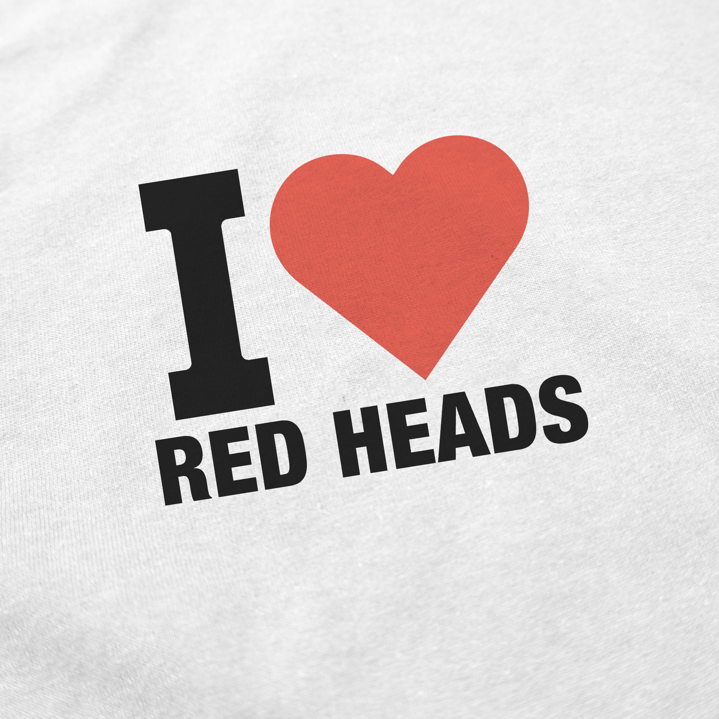 The I Heart Red Heads T-Shirt is a white, high-quality cotton shirt featuring "I ♥ RED HEADS" in bold black letters and a large red heart—ideal for fans of funny shirts.