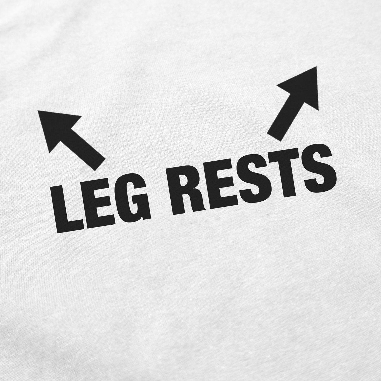 The Leg Rests T-Shirt features bold black text and two black arrows pointing diagonally upward—ideal for fans of funny shirts or anyone seeking unique Illegal Shirts designs.