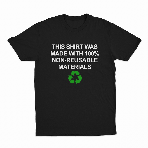 The “This Shirt Was Made with 100% Non-Reusable Materials T-Shirt” is a black cotton tee featuring white text and a green recycling symbol—a funny conversation starter for those who love witty shirts.
