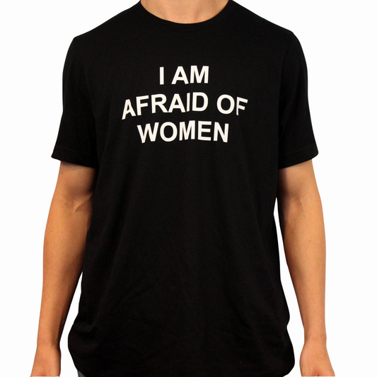 Wearing the I Am Afraid Of Women T-Shirt—an ethically made cotton tee with bold white text on black—makes a funny, eye-catching statement and is sure to spark conversation.