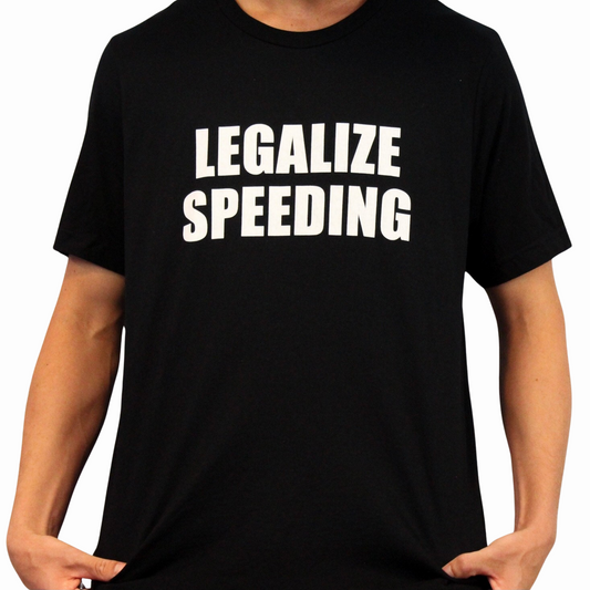 Wearing the Legalize Speeding T-Shirt, featuring bold white LEGALIZE SPEEDING text across the chest, makes a striking traffic court statement.