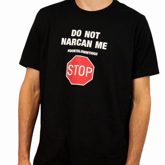 The Do Not Narcan Me T-Shirt, crafted from 100% combed ring-spun cotton, showcases white text above a red stop sign with "STOP"—a standout piece from Illegal Shirts.