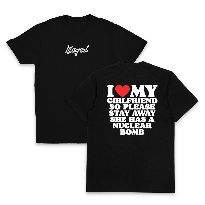 Two black I Heart My Girlfriend So Please Stay Away She Has A Nuclear Bomb T-Shirts (Backprint), made from 175 GSM ethically grown cotton; “Illegal” in white script on the front, bold back text: I ♥ MY GIRLFRIEND SO PLEASE STAY AWAY SHE HAS A NUCLEAR BOMB.