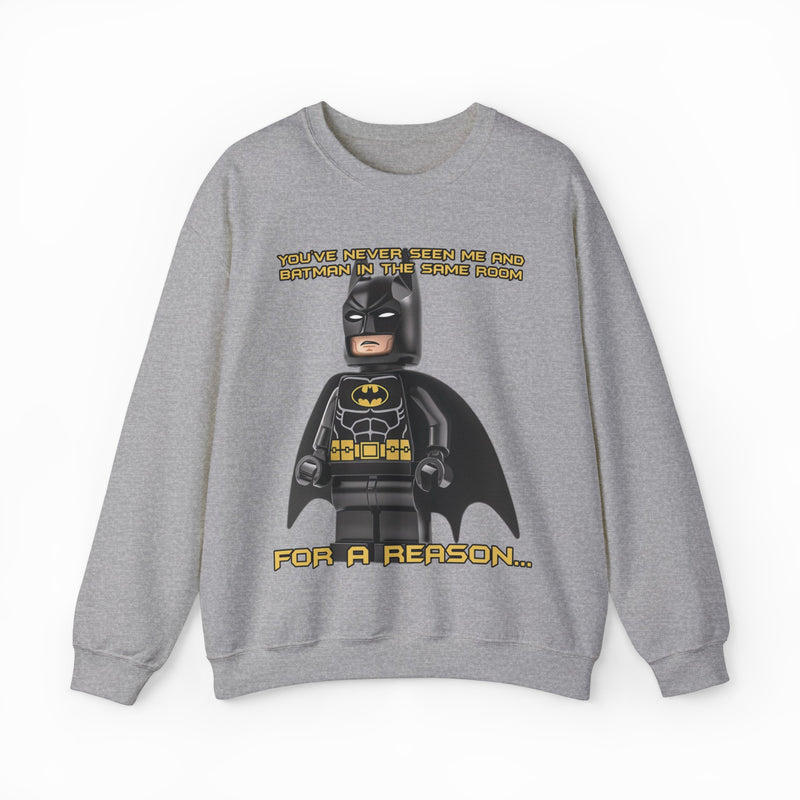 The "You've Never Seen Me And Batman In The Same Room For A Reason..." Crewneck features a gray LEGO Batman design with witty yellow text—perfect for fans seeking a fun, conversation-starting shirt.