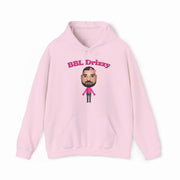 The BBL Drizzy Hoodie is a light pink cotton-polyester blend featuring bold pink "BBL Drizzy" text above a cartoon with a beard, short hair, and a pink shirt with black pants. Part of our exclusive Illegal Shirts collection.