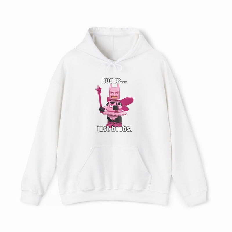 The “Boobs... Just Boobs. Hoodie” from Illegal Shirts is a white cotton-polyester sweatshirt featuring a pink LEGO-style fairy with a wand and bold text for a playful, statement look.