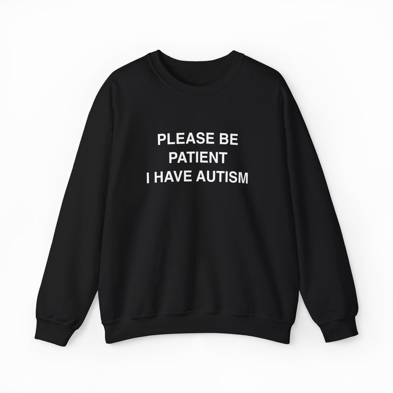 The Please Be Patient I Have Autism Crewneck is a black shirt featuring "PLEASE BE PATIENT I HAVE AUTISM" in bold white letters on the front—a powerful design from Illegal Shirts.