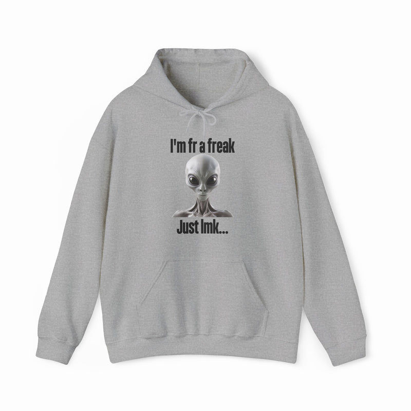 The "I'm FR A Freak Just LMK... Hoodie" by Illegal Shirts is a gray hoodie featuring a wide-eyed alien graphic and bold black lettering on medium-heavy fabric for lasting comfort and style.