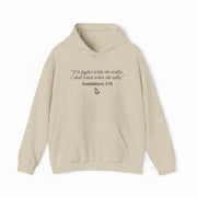 The Assalations 3:16 Hoodie is a beige, medium-heavy hooded sweatshirt featuring bold black text—“If it jiggles while she walks, I shall listen when she talks. Assalations 3:16”—plus praying hands artwork. A standout piece from Illegal Shirts.