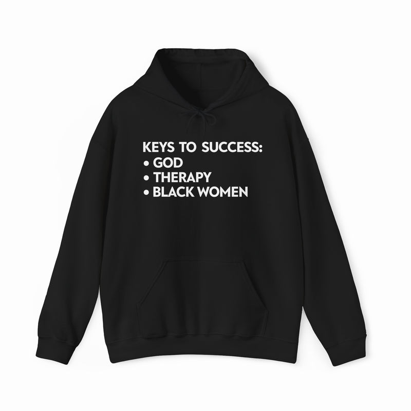 The Keys To Success Hoodie by Illegal Shirts is a black cotton-polyester hoodie featuring "KEYS TO SUCCESS: • GOD • THERAPY • BLACK WOMEN" printed in bold white uppercase letters on the front.