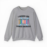 The I Fucking Love Chinese Chemicals Crewneck is a gray sweatshirt with colorful vape pens and lightning bolts graphic, plus bold text. Ideal for Illegal Shirts fans or anyone wanting a funny shirt that makes a statement.