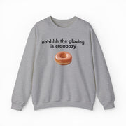 The Nah The Glazing Is Crazy Crewneck is a gray sweatshirt featuring a glazed donut photo and the phrase "nahhhh the glazing is craaaazy"—a fun pick for fans of humorous shirts.