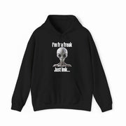 The "I'm FR A Freak Just LMK... Hoodie" is a black hoodie with a gray alien head graphic, white quirky text, and medium-heavy fabric—perfect for fans of unique Illegal Shirts style.