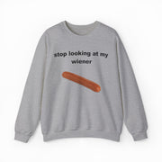 The Stop Looking At My Wiener Crewneck is a grey sweatshirt with a playful hot dog graphic—ideal for anyone who loves fun, eye-catching shirts.