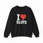 The I Heart Sluts Crewneck by Illegal Shirts is a black sweatshirt with “I Heart Sluts” in bold white letters and a large red heart, crafted from medium-heavy fabric for lasting comfort.