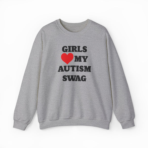 The Girls Heart My Autism Swag Crewneck is a gray sweatshirt featuring bold black letters and a red heart, perfect for anyone who loves making a fun, confident statement.