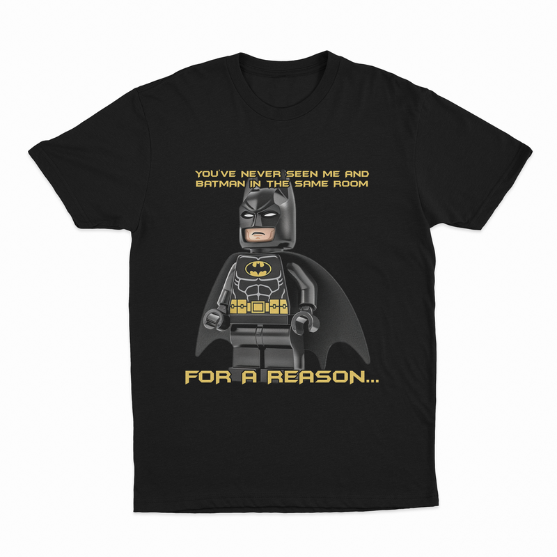 The "You've Never Seen Me And Batman In The Same Room For A Reason..." T-Shirt features bold yellow text, making it a fun conversation starter and a must-have for fans of funny graphic tees.