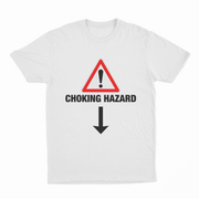 The Choking Hazard T-Shirt is a white, 175 GSM tee made from ethically grown cotton, featuring a red warning triangle with an exclamation mark, bold "CHOKING HAZARD" text, and a black downward arrow below the message.