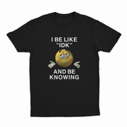 The I Be Like "IDK" And Be Knowing T-Shirt features a smiling shrugging emoji and bold text, making it an ideal conversation starter for anyone who loves funny shirts.