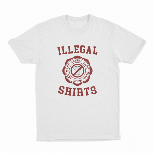 The Illegal Shirts Emblem T-Shirt features "ILLEGAL SHIRTS" in bold red, a round emblem with "ARMANDO CANINO PIEGQUINA 2022," and a shirt icon inside a red circle with a slash—ideal for fans of humorous tees.