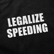 The Legalize Speeding T-Shirt is made from ethically grown black cotton and features bold white LEGALIZE SPEEDING text.