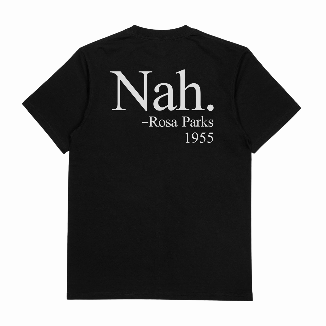 The Nah. T-Shirt (Backprint) is a black tee made from ethically grown cotton, 175 GSM, featuring large white "Nah." text on the back with smaller "- Rosa Parks 1955" beneath.