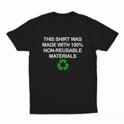The “This Shirt Was Made with 100% Non-Reusable Materials T-Shirt” is a black cotton tee featuring white text and a green recycling symbol—a funny conversation starter for those who love witty shirts.