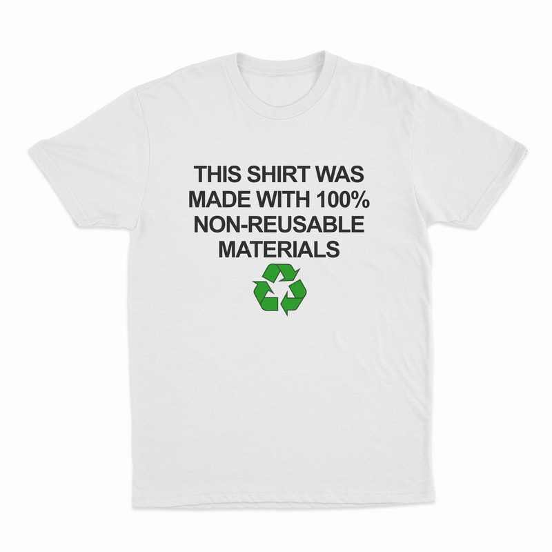 The "This Shirt Was Made with 100% Non-Reusable Materials T-Shirt" is a 100% cotton tee featuring bold black text above a green recycling symbol—a humorous design perfect for sparking conversations.