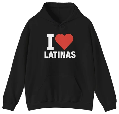 The I Heart Latinas Hoodie features bold white text with a large red heart on a black hoodie, made from medium-heavy fabric for comfort and warmth. Part of the exclusive Illegal Shirts collection.