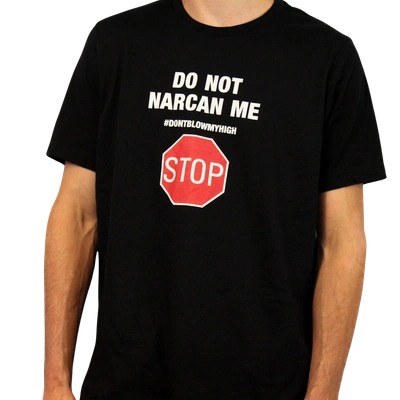 The Do Not Narcan Me T-Shirt, crafted from 100% combed ring-spun cotton, showcases white text above a red stop sign with "STOP"—a standout piece from Illegal Shirts.