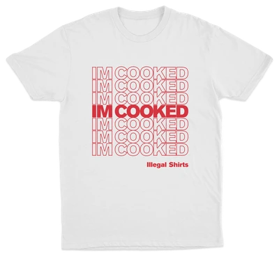 The I'm Cooked T-Shirt features repeated red "IM COOKED" text in a grid with the center row bolded. "Illegal Shirts" appears below in smaller red text. Stand out with this fun and unique design!.
