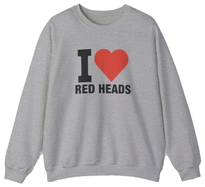 The I Heart Red Heads Crewneck is a gray cotton-polyester sweatshirt with long sleeves, a crew neck, and "I Heart Red Heads" with a red heart on the front. Part of the playful Illegal Shirts collection.