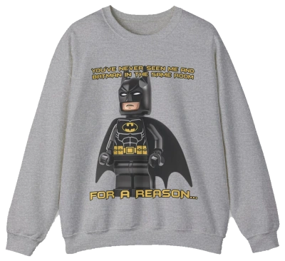 The "You've Never Seen Me And Batman In The Same Room For A Reason..." Crewneck features a gray LEGO Batman design with witty yellow text—perfect for fans seeking a fun, conversation-starting shirt.