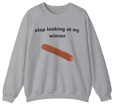 The Stop Looking At My Wiener Crewneck is a grey sweatshirt with a playful hot dog graphic—ideal for anyone who loves fun, eye-catching shirts.