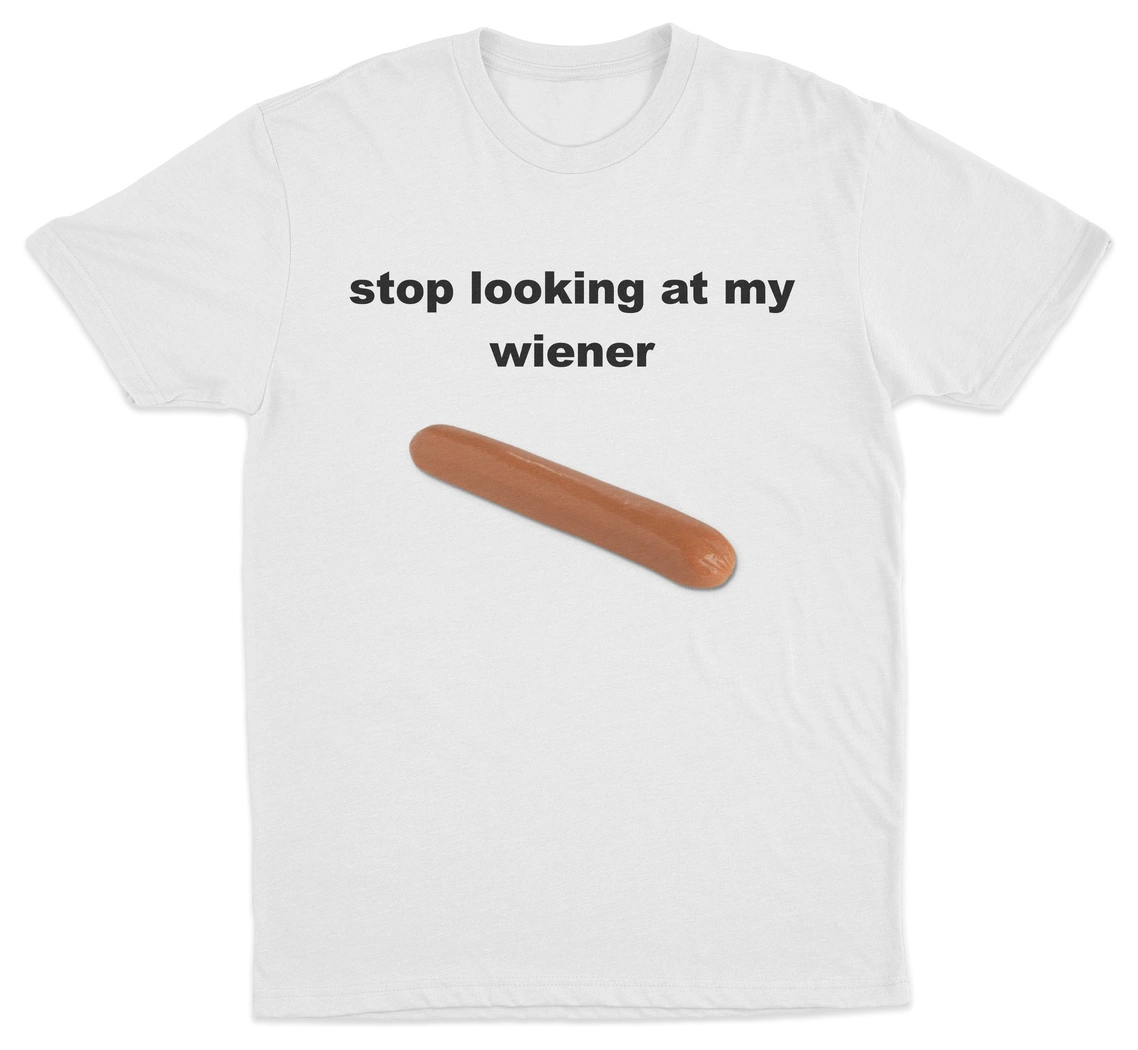 The Stop Looking At My Wiener T-Shirt features black text and a hot dog graphic on white cotton—grab this cheeky statement tee from Illegal Shirts!.